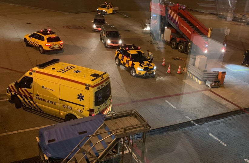 Suspect situation aboard a plane at Amsterdam's Schiphol airport (photo credit: PETER VANDERMERTZ)