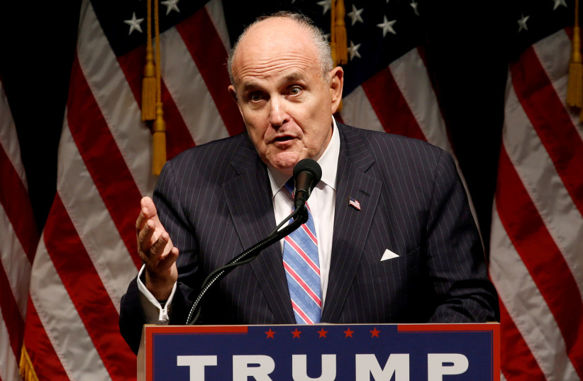Rudy Giuliani delivers remarks before Donald Trump rallies with supporters in Council Bluffs, Iowa, U.S., September 28, 2016. (photo credit: REUTERS / JONATHAN ERNST)