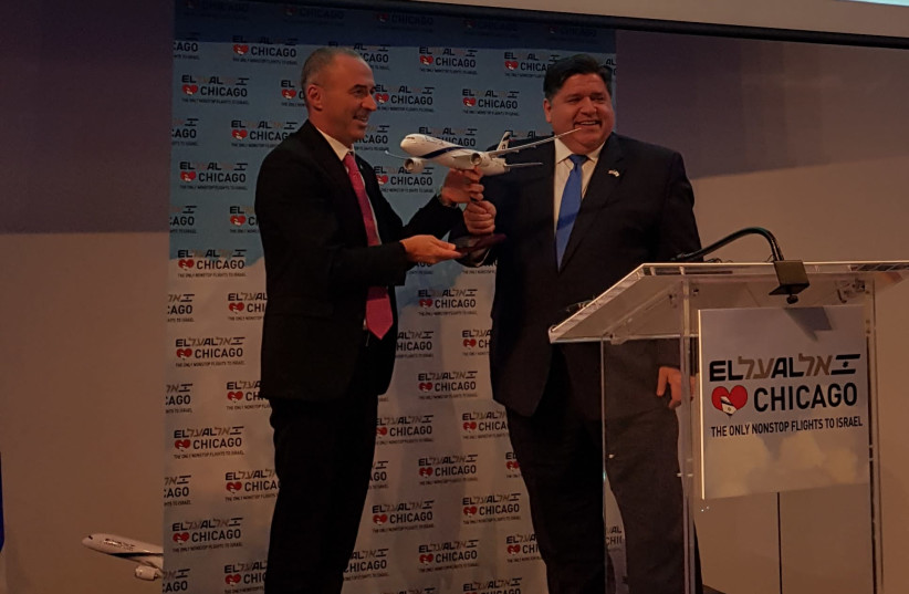 El Al's CEO Gonen Usishkin presents a model of the Dreamliner that will fly between Chicago and Tel Aviv to Illinois Governor J.B. Pritzker (photo credit: STEVE LINDE)