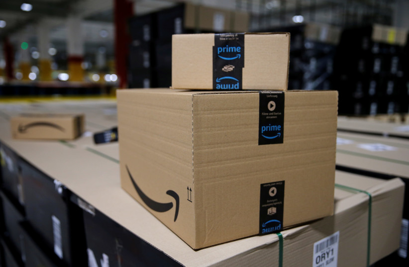 Amazon packages awaiting dispatch (photo credit: PASCAL ROSSIGNOL/REUTERS)