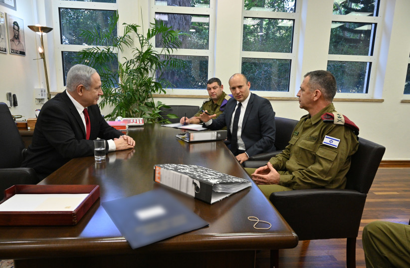 Prime Minister Benjamin Netanyahu with newly-appointed Defense Minister Naftali Bennett and IDF Chief of Staff Lt.-Gen. Aviv Kochavi (photo credit: ARIEL HERMONI/DEFENSE MINISTRY)