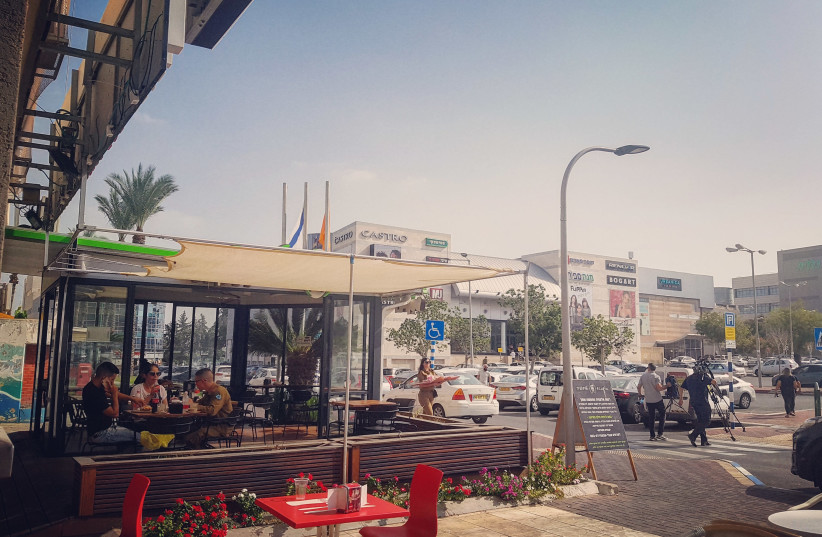 Life in Ashkelon carries on as rockets continue to pound southern Israel. (photo credit: ILANIT CHERNICK)