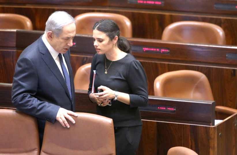 FORMER JUSTICE MINISTER Ayelet Shaked converses with Prime Minister Benjamin Netanyahu at the Knesset. (photo credit: Courtesy)