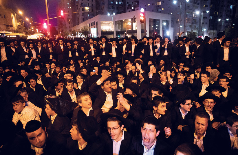 Ultra-Orthodox men protest in Jerusalem last November (photo credit: RONEN ZVULUN/REUTERS)