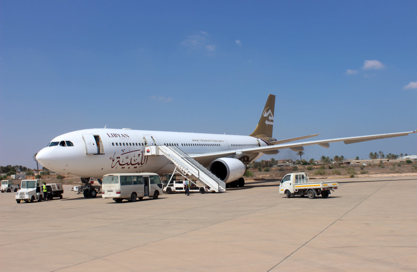 A Libyan Airways aircraft stands on the runway at Misrata airport in Misrata, Libya, September 20, 2018. (credit: AYMAN AL-SAHILI/REUTERS)