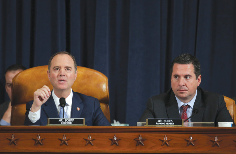 Committee Chairman Adam Schift [L] speaks as ranking member Rep. Devin Nunes [R] listens as former US Ambassador to Ukraine Marie Yovanovitch testifies before the House Intelligence Committee hearing as part of the impeachment inquiry. (photo credit: REUTERS)