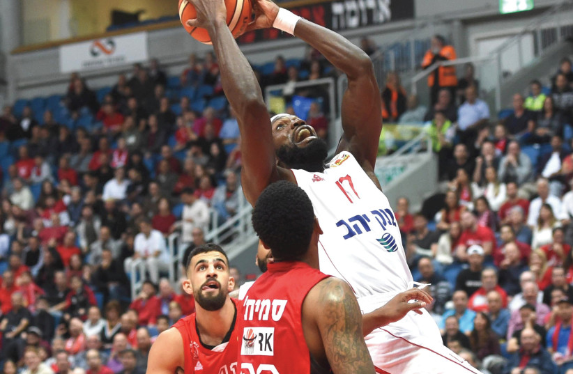 SULEIMAN BRAIMOH (17) and Hapoel Jerusalem gutted out a 85-80 victory over Hapoel Tel Aviv in the State Cup last-16 and will meet Maccabi Tel Aviv in the quarterfinals.  (photo credit: BERNEY ARDOV)