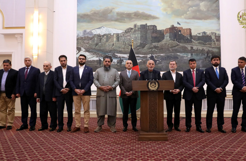 Afghanistan's President Ashraf Ghani speaks about the release of two senior Taliban commanders and a leader of the Haqqani militant group in exchange for an American and an Australian professor who were kidnapped in 2016, in Kabul, Afghanistan November 12, 2019 (photo credit: AFGHAN PRESIDENTIAL PALACE /HANDOUT VIA REUTERS)