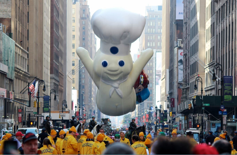 THE ICONIC Pillsbury Doughboy floats high above New York City during a recent Macy’s Thanksgiving Day Parade (photo credit: SHINYA SUZUKI/FLICKR)