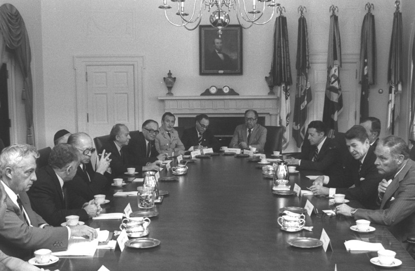 US President Ronald Reagan also discussed the 'settelments,' in this file picture members of the Israeli delegations such as Prime Minister Menachem Begin and Defense Minister Ariel Sharon can be seen on the left. Washington 1981.  (photo credit: REUTERS)
