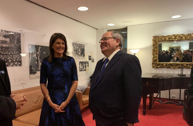 Former US Ambassador to the United Nations, Nikki Haley  and Consulate General of Israel in New York, Dani Dayan chat at the IAJF 2019 gala (credit: CONSULATE GENERAL IN NEW YORK)