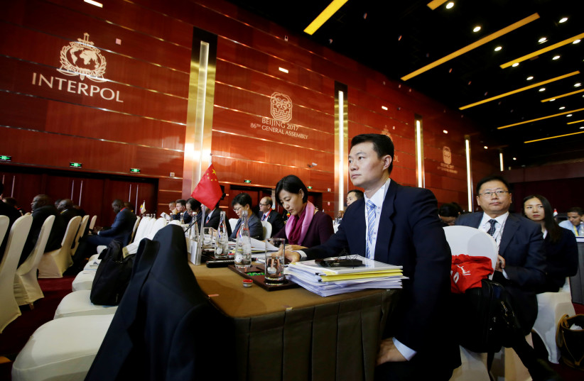 Chinese delegates attend the 86th INTERPOL General Assembly at Beijing National Convention Center in Beijing, China September 27, 2017 (photo credit: REUTERS/JASON LEE)