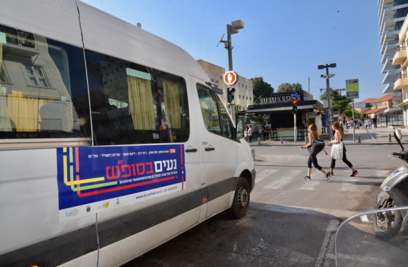 Public busses were seen on the streets of Tel Aviv on Shabbat for the first time in Israel’s history (photo credit: AVSHALOM SASSONI/MAARIV)