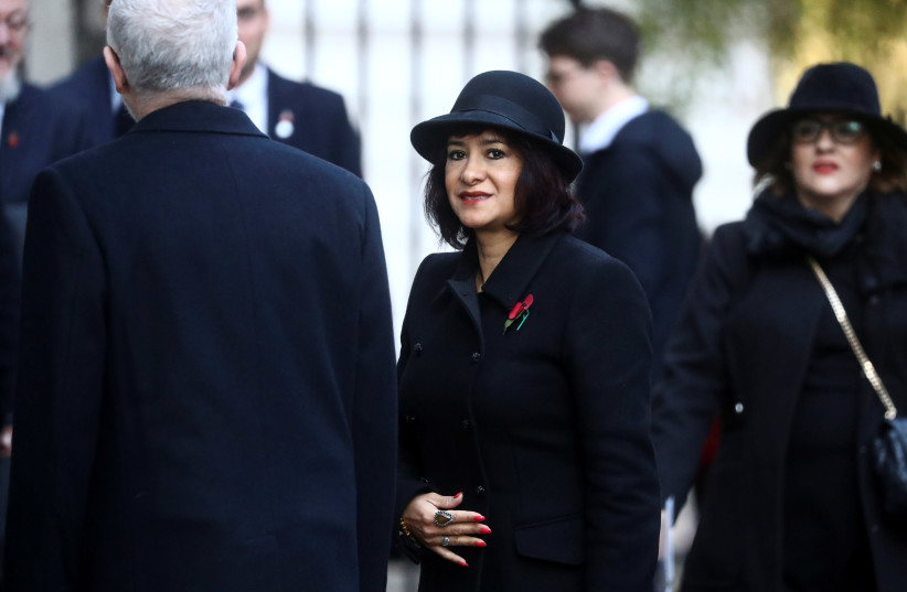 Britain's opposition Labour Party leader Jeremy Corbyn arrives with his wife Laura Alvarez to attend the National Service of Remembrance, on Remembrance Sunday, at The Cenotaph in Westminster, London, Britain, November 10, 2019.  (photo credit: REUTERS)