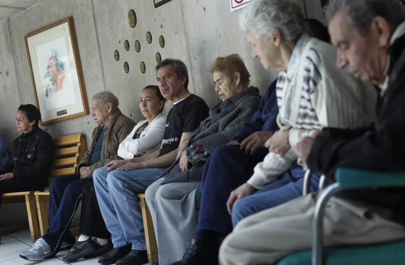  Patients with Alzheimer's and dementia are sit inside the Alzheimer foundation in Mexico City (photo credit: EDGARD GARRIDO/ REUTERS)