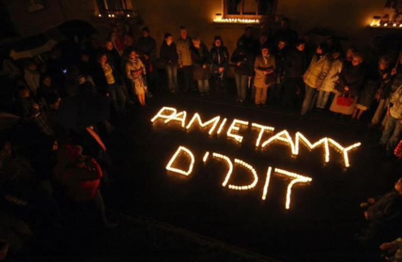 Oświęcim residents honor the memory of the Jewish community that once lived in the town placed so close tot the Auschwitz death camp, the words in Hebrew and Polish mean 'We remember', picture is from 2008    (photo credit: Wikimedia Commons)