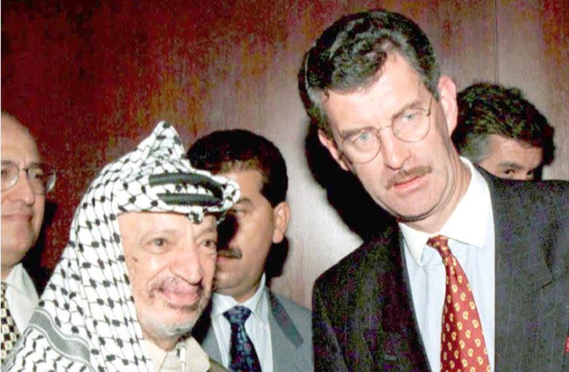 PLO leader Yasser Arafat shakes hands with Irish foreign minister Dick Spring in 1996 (photo credit: REUTERS)