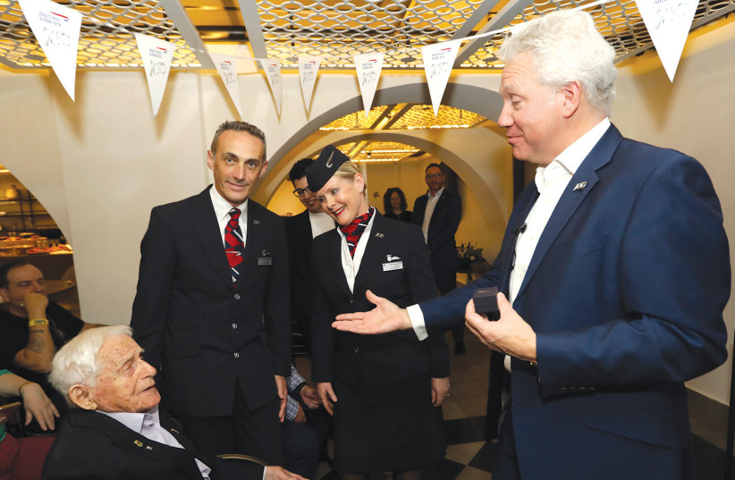 Andrew Brem presents British Airways oldest employee award tp Alex Zielony while BA ambassadors John Folwer and Sheila Beesley look on. (photo credit: SIVAN FARAG)