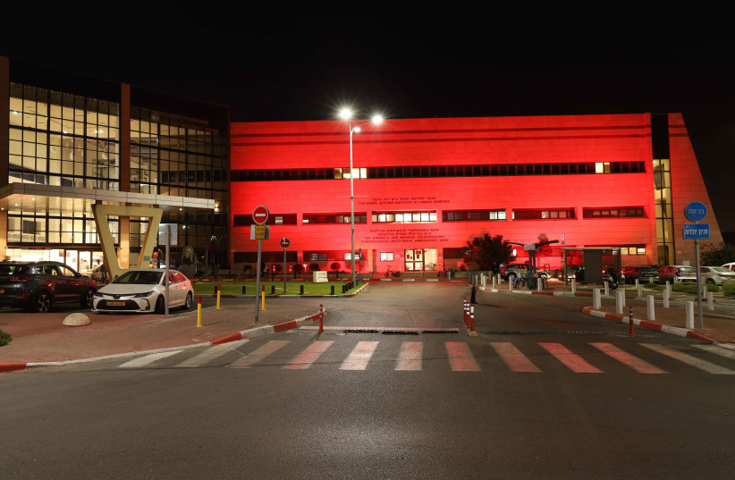 Hospital lighting up in red to mark world AIDS day (photo credit: SHEBA MEDICAL CENTER)