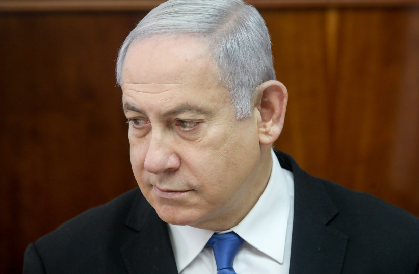 Prime Minister Benjamin Netanyahu attends a cabinet meeting, December 2019. (photo credit: MARC ISRAEL SELLEM)
