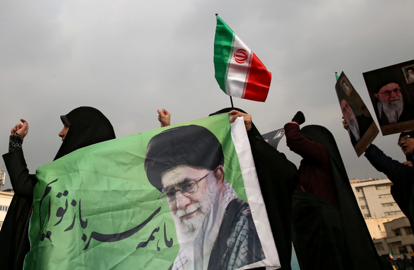 Iranian pro-government protesters attend a demonstration in Tehran (photo credit: REUTERS)