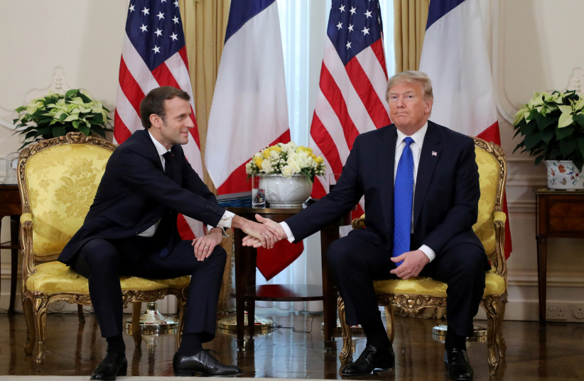 U.S. President Trump meets France's President Macron, ahead of the NATO summit, in London (photo credit: LUDOVIC MARIN/POOL VIA REUTERS)