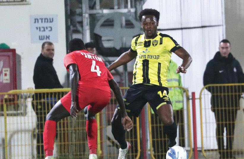 BEITAR JERUSALEM got an 89th-minute equalizer from Levi Garcia (14) on Sunday night to earn a point with a 2-2 away draw at Ashdod SC in Premier League action. (photo credit: DANNY MARON)