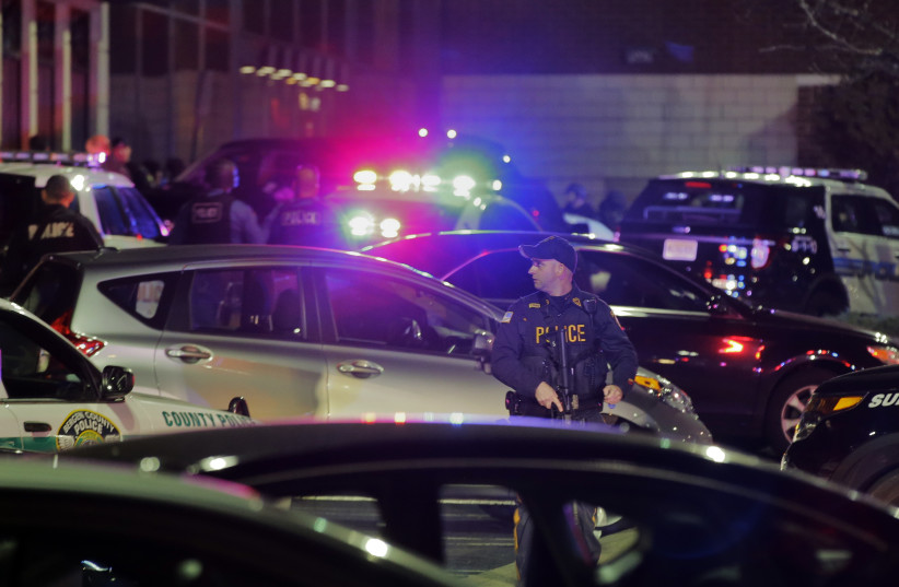 Police secure the area after reports that a gunman fired shots in New Jersey (photo credit: REUTERS/RAY STUBBLEBINE)