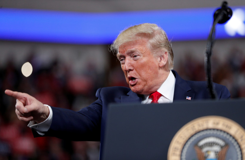 U.S. President Donald Trump delivers remarks during a campaign rally at the Giant Center in Hershey, Pennsylvania, U.S., December 10, 2019 (photo credit: REUTERS//TOM BRENNER)