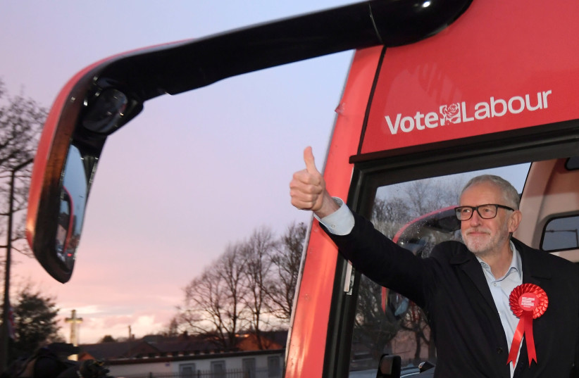 Britain's opposition Labour Party leader Jeremy Corbyn gestures as he arrives to attend a general election campaign rally in Sheffield, Britain (photo credit: REUTERS/TOBY MELVILLE)
