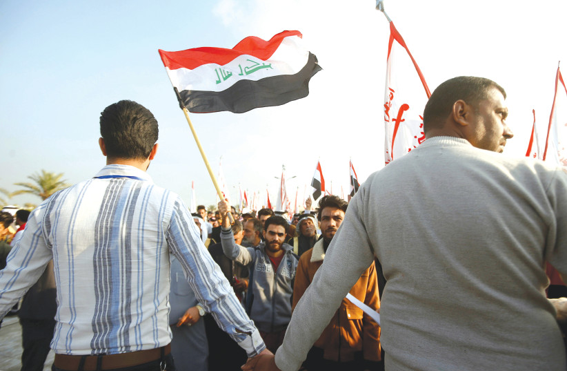 Iraqi demonstrators and tribesmen gather during ongoing anti-government protests in Basra, this week.  (photo credit: ESSAM AL-SUDANI/ REUTERS)