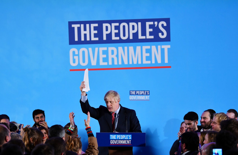 Britain's Prime Minister Boris Johnson speaks during a Conservative Party event following the results of the general election in London, Britain, December 13, 2019 (photo credit: DYLAN MARTINEZ/REUTERS)