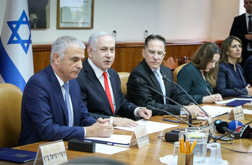 Prime Minister Benjamin Netanyahu attends a cabinet meeting on December 15, 2019 (photo credit: MARC ISRAEL SELLEM/THE JERUSALEM POST)