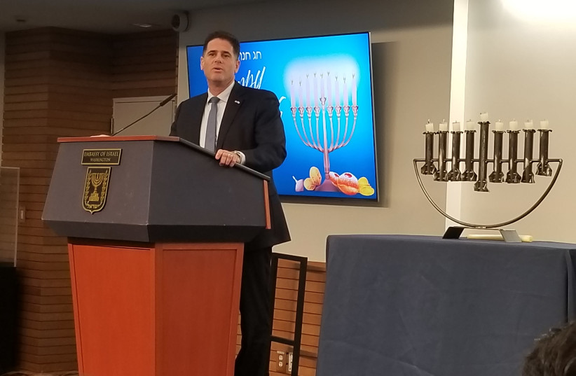 Ron Dermer at a Hanukkah event at the Israeli embassy in Washington, where a menorah made of fragments of rockets fired against Israel was lit (December 17, 2019). (photo credit: OMRI NAHMIAS)