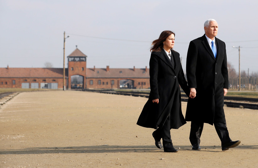 US Vice President Mike Pence with his wife Karen visit the former Nazi German concentration and extermination camp Auschwitz II-Birkenau, near Oswiecim, Poland, February 15, 2019 (photo credit: REUTERS/KACPER PEMPEL)