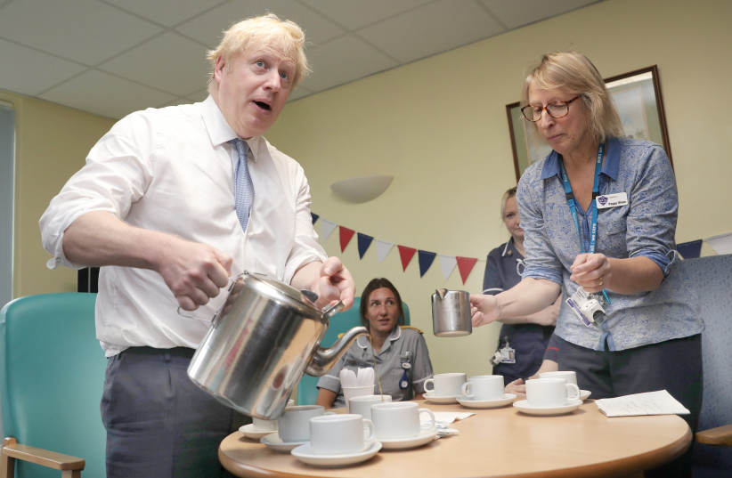  LEGACY By Thomas Harding William Heinemann 560 pages; $29.69 TEA WAS the liftoff point for a Jewish refugee who built an empire. (Pictured: British Prime Minister Boris Johnson pours tea during a campaign stop in England last month; Dan Kitwood/Pool via Reuters) (photo credit: REUTERS)