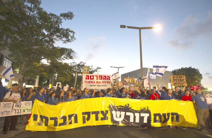 ISRAELIS DEMONSTRATE for social justice in Tel Aviv in 2012. (photo credit: REUTERS)