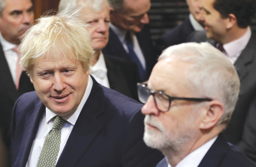 Britain's Prime Minister Boris Johnson and opposition Labour Party leader Jeremy Corbyn attend the State Opening of Parliament in London (photo credit: KIRSTY WIGGLESWORTH/REUTERS)
