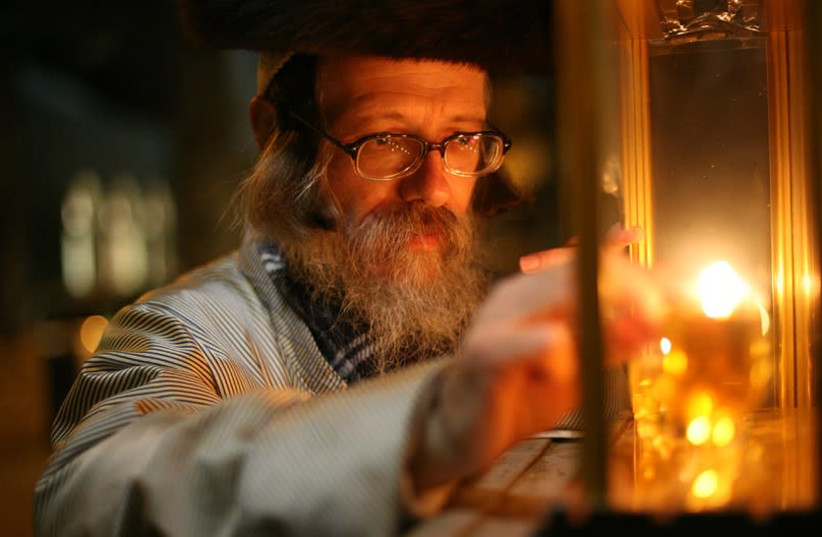 An exhibit of 11 photographs of Hasidim celebrating Hanukkah, all the work of Polish photographer Agnieszka Traczewska, will be on display at the 14th St. Y in Manhattan through late January (photo credit: AGNIESZKA TRACZEWSKA VIA JTA)