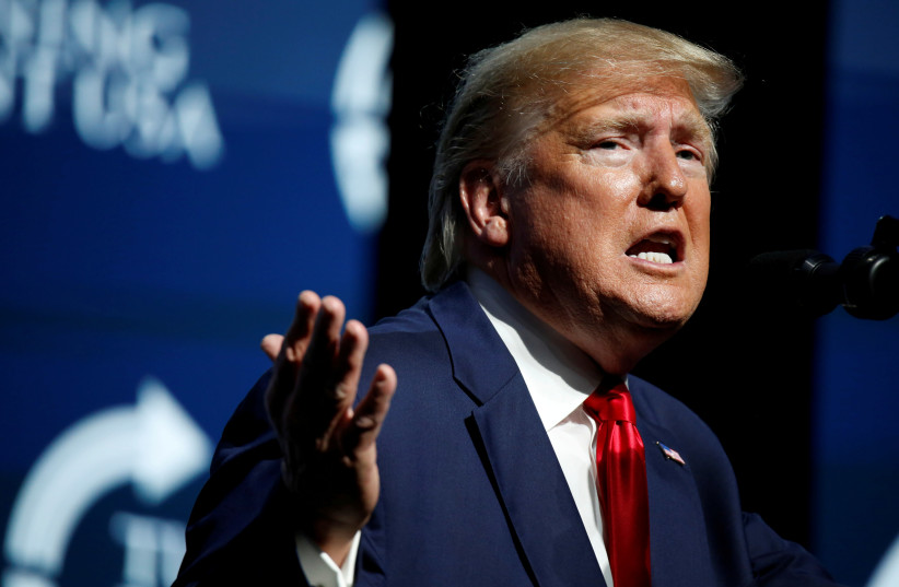 U.S. President Donald Trump delivers remarks at the Turning Point USA Student Action Summit at the Palm Beach County Convention Center in West Palm Beach, Florida, U.S. December 21, 2019 (photo credit: MARCO BELLO/REUTERS)