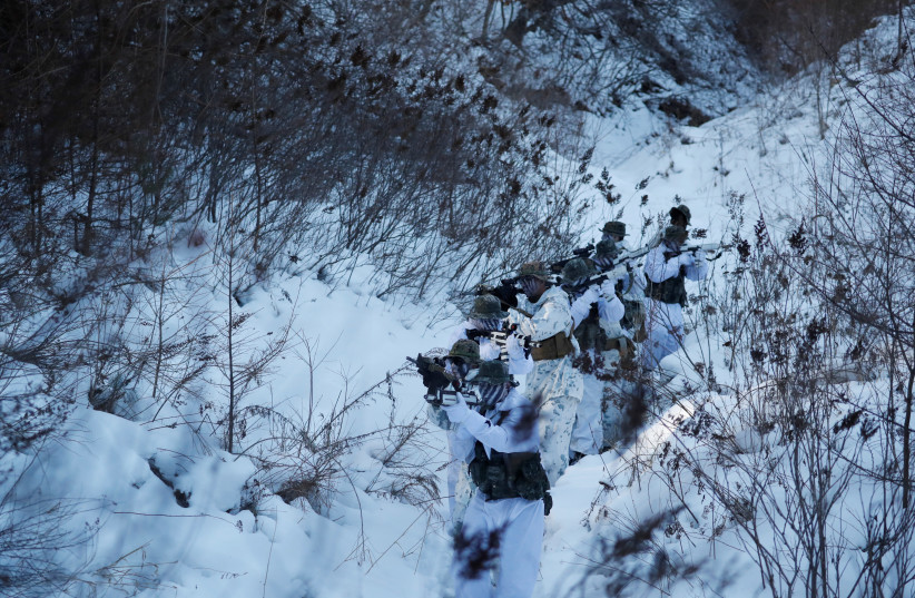 South Korean and U.S. Marines take part in a winter military drill in Pyeongchang (photo credit: REUTERS)