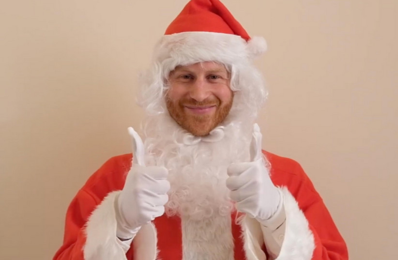 Prince Harry dressed as Santa Clause (photo credit: SCOTTY’S LITTLE SOLDIERS)