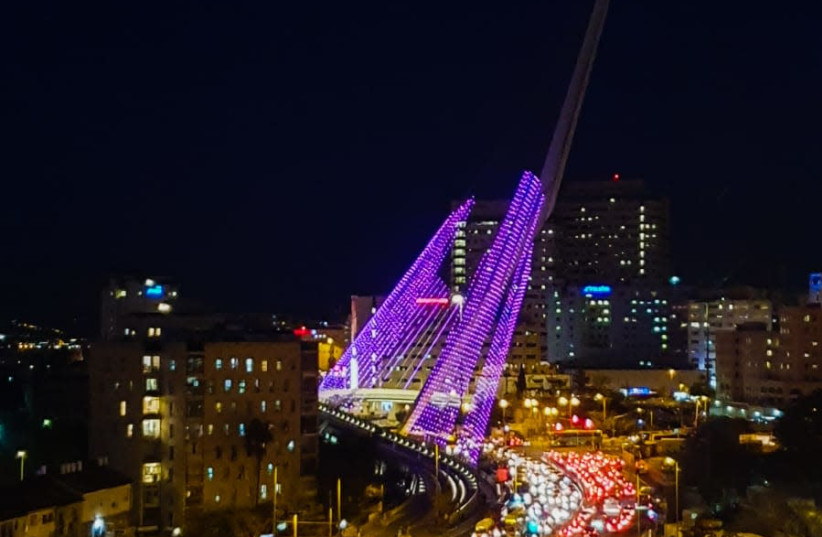 The Chords Bridge in Jerusalem is lit in purple in support of Shalva. (photo credit: SHALVA)