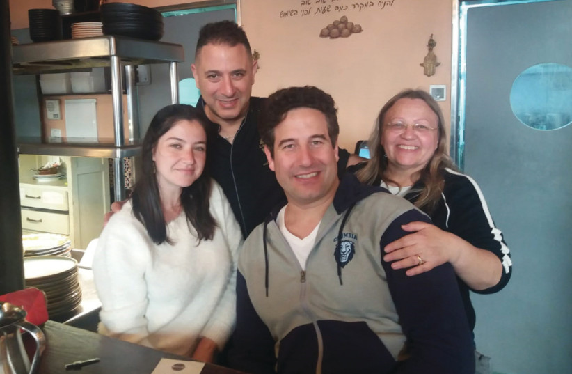 MASTER CHEF Avi Levi, proprietor of Hamotzi, with (from left) Daniela Goldinger, Amit Boyarski and Vered Kopolovich. (photo credit: VERED KOPOLOVICH)