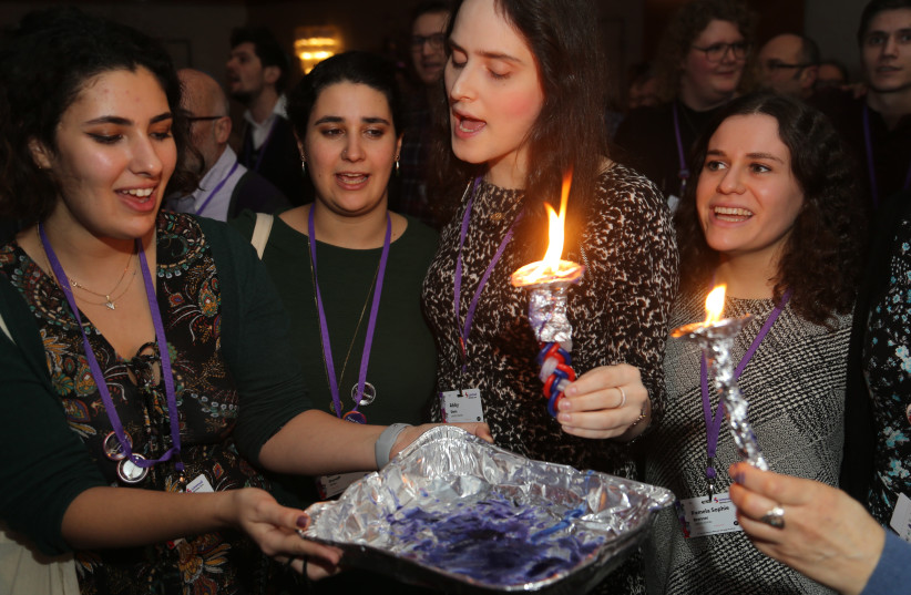 Celebrating Havdalah at Limmud Festival 2019, with Abby Stein (3rd from Left), who was a Chasidic rabbi and is today a transgender woman activist. (photo credit: LIMMUD)