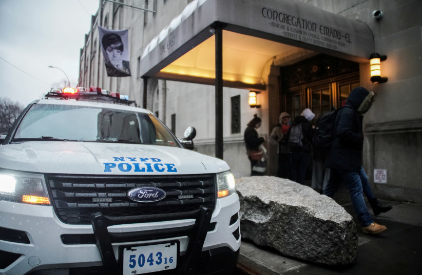 New York Police Department by the Fifth Avenue Synagogue (photo credit: JEENAH MOON/REUTERS)
