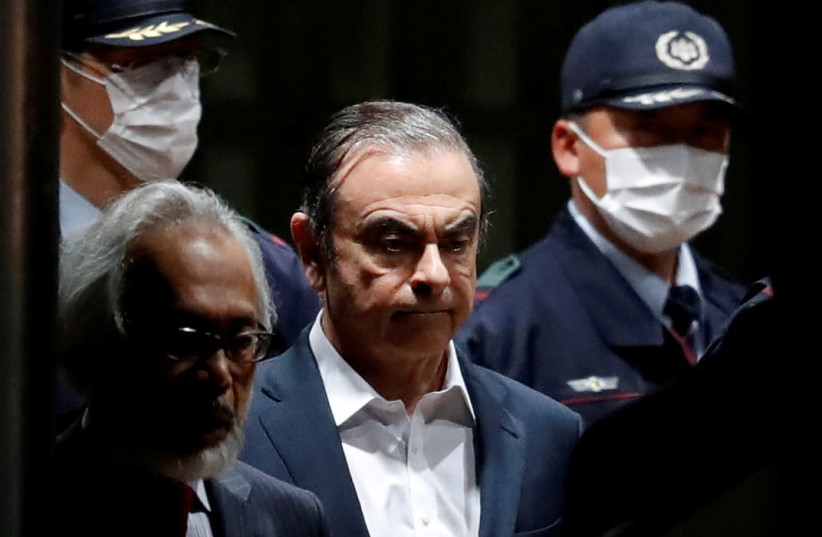 Former Nissan Motor Chariman Carlos Ghosn leaves the Tokyo Detention House (photo credit: REUTERS)