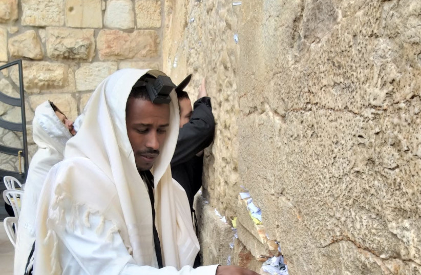 Baye Alemye visiting the Western Wall (photo credit: COURTESY OF FAMILY)