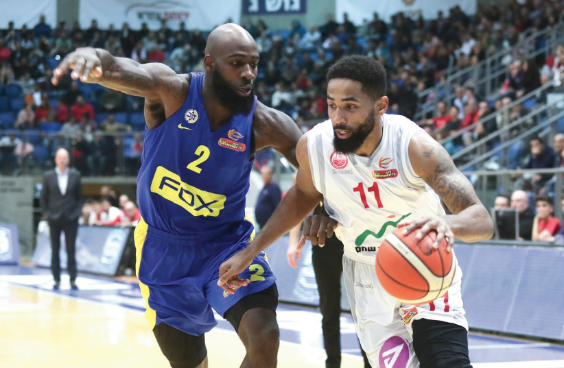 MACCABI TEL AVIV forward Quincy Acy (left) and Hapoel Beersheba’s Da’Sean Butler (right) are two foreign players who make a big impact on their Israeli teams. (photo credit: DANNY MARON)