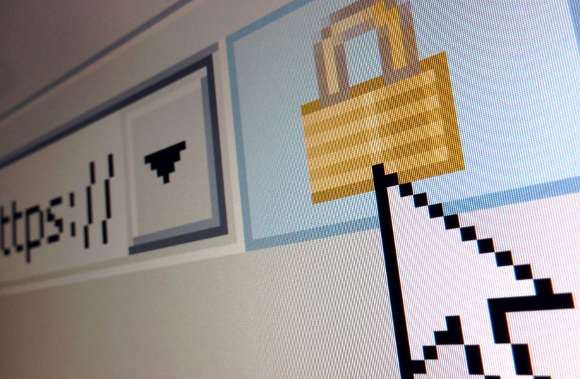 A lock icon, signifying an encrypted Internet connection, is seen on an Internet Explorer browser in a photo illustration in Paris April 15, 2014 (credit: MAL LANGSDON/REUTERS)